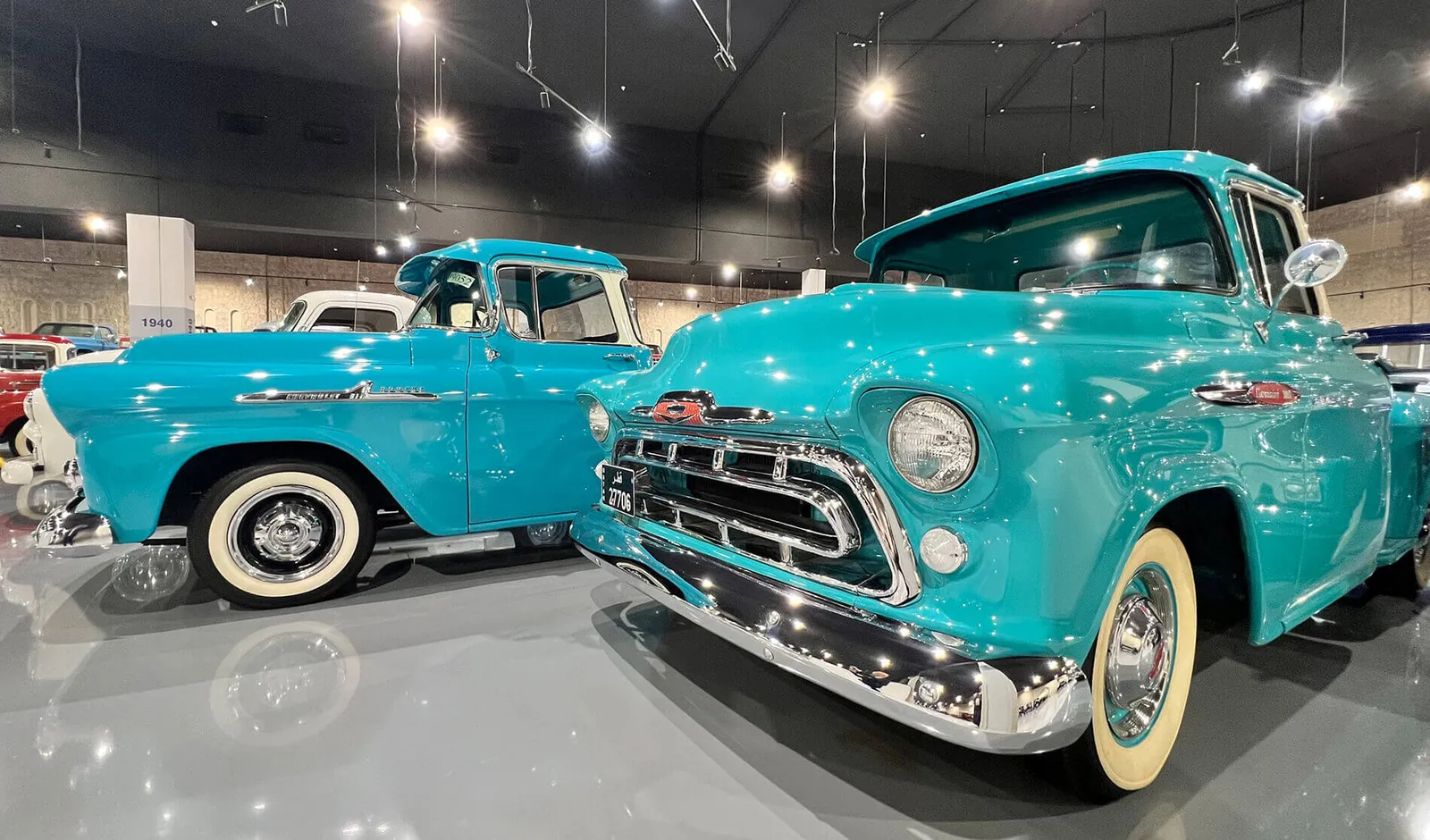 Restored teal vintage pickup truck on display