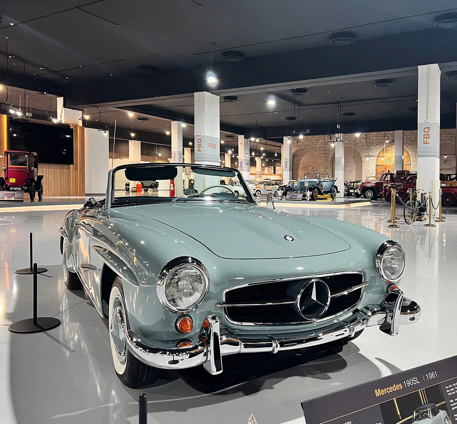 Pale green vintage Mercedes-Benz-style roadster on display